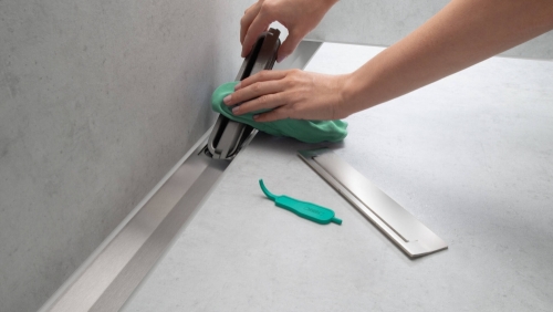 Hansgrohe RainDrain Flex zuhanylefolyó színkészlet 1000, méretre vágható fali illesztéshez, szálcsiszolt bronz 56053140